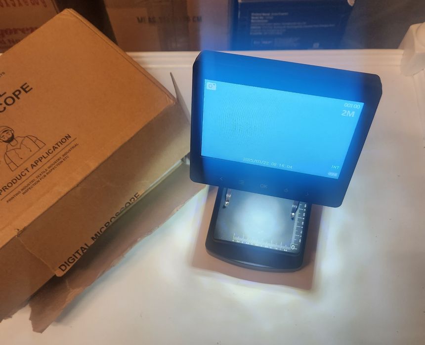 Microscópio a bateria novo