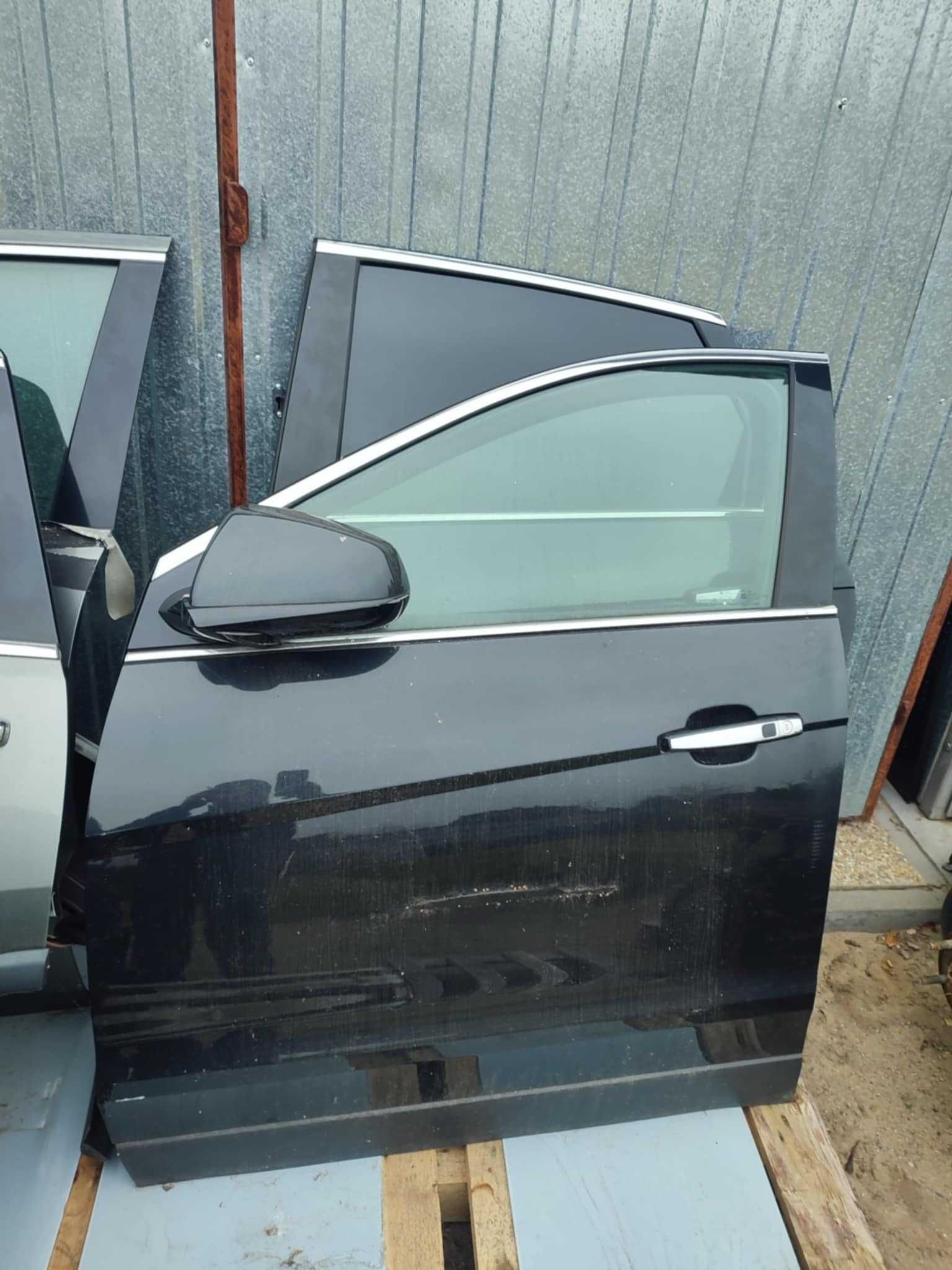 Cadillac SRX drzwi przednie lewe kompletne 2010-16