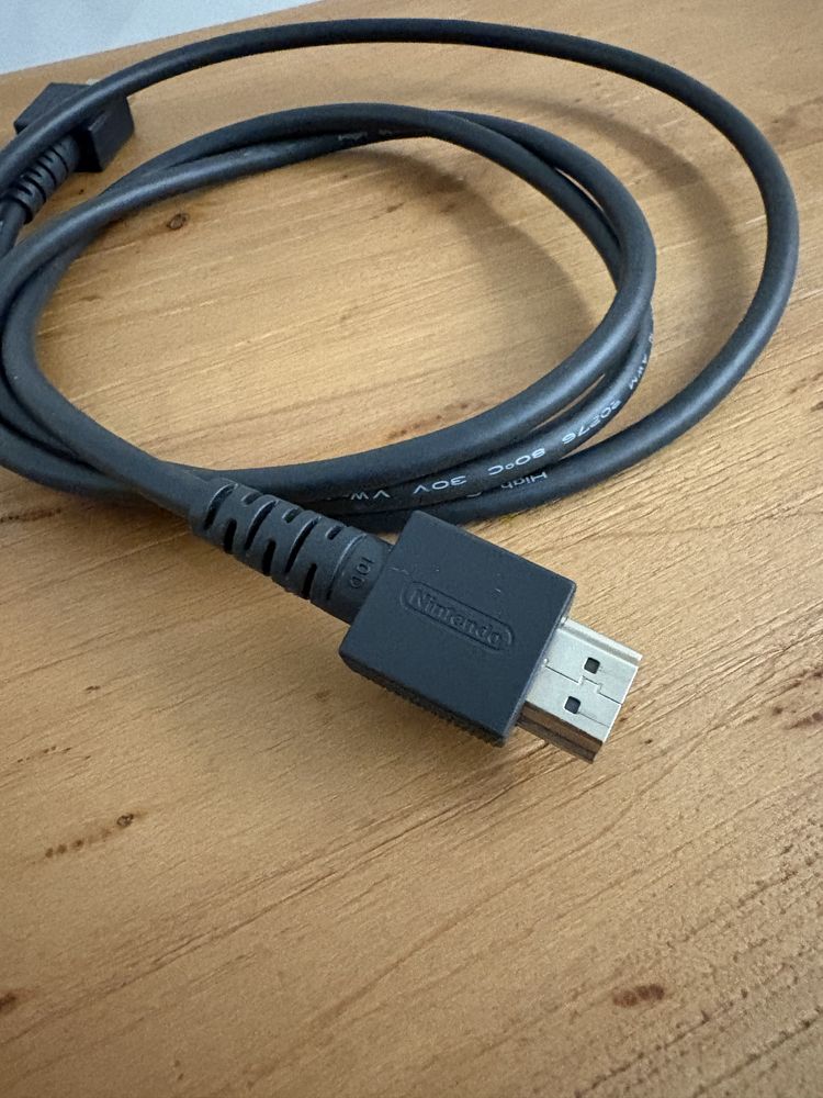 Nintendo Switch V2 com comandos cinza + bolsa + cabo hdmi