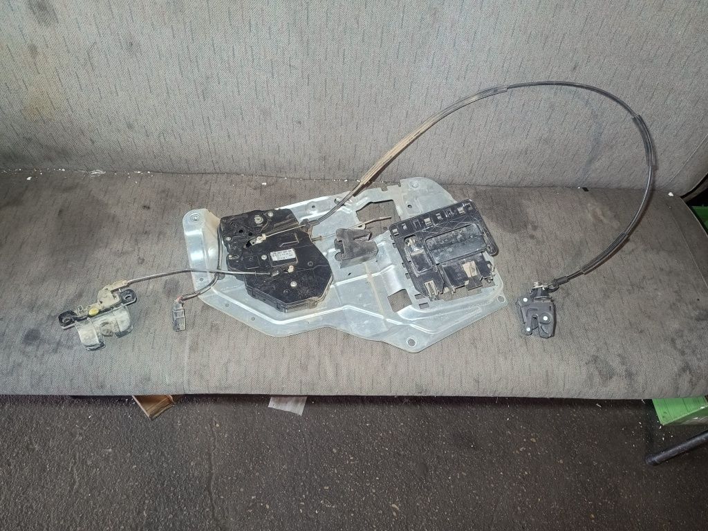 Zamek mechanizm drzwi lewy tył furtki VW T5 oryginał komplet gwarancja