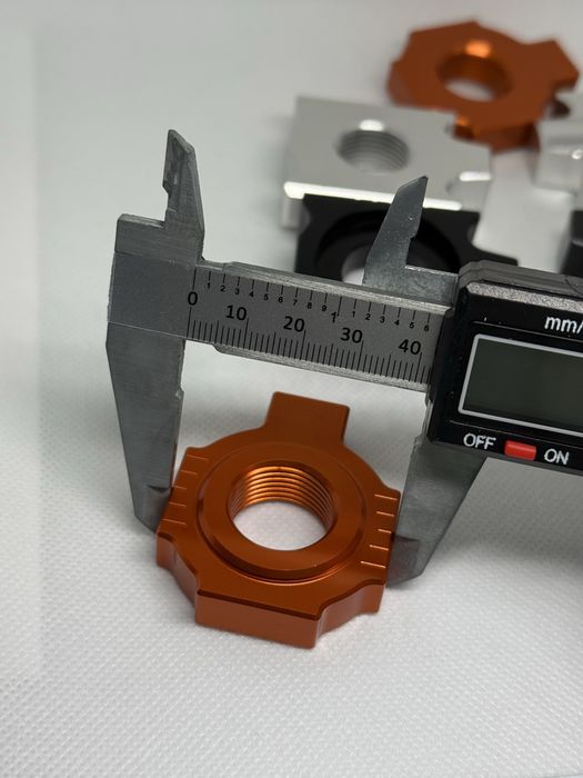 Блок регулювання натяжника для ланцюга