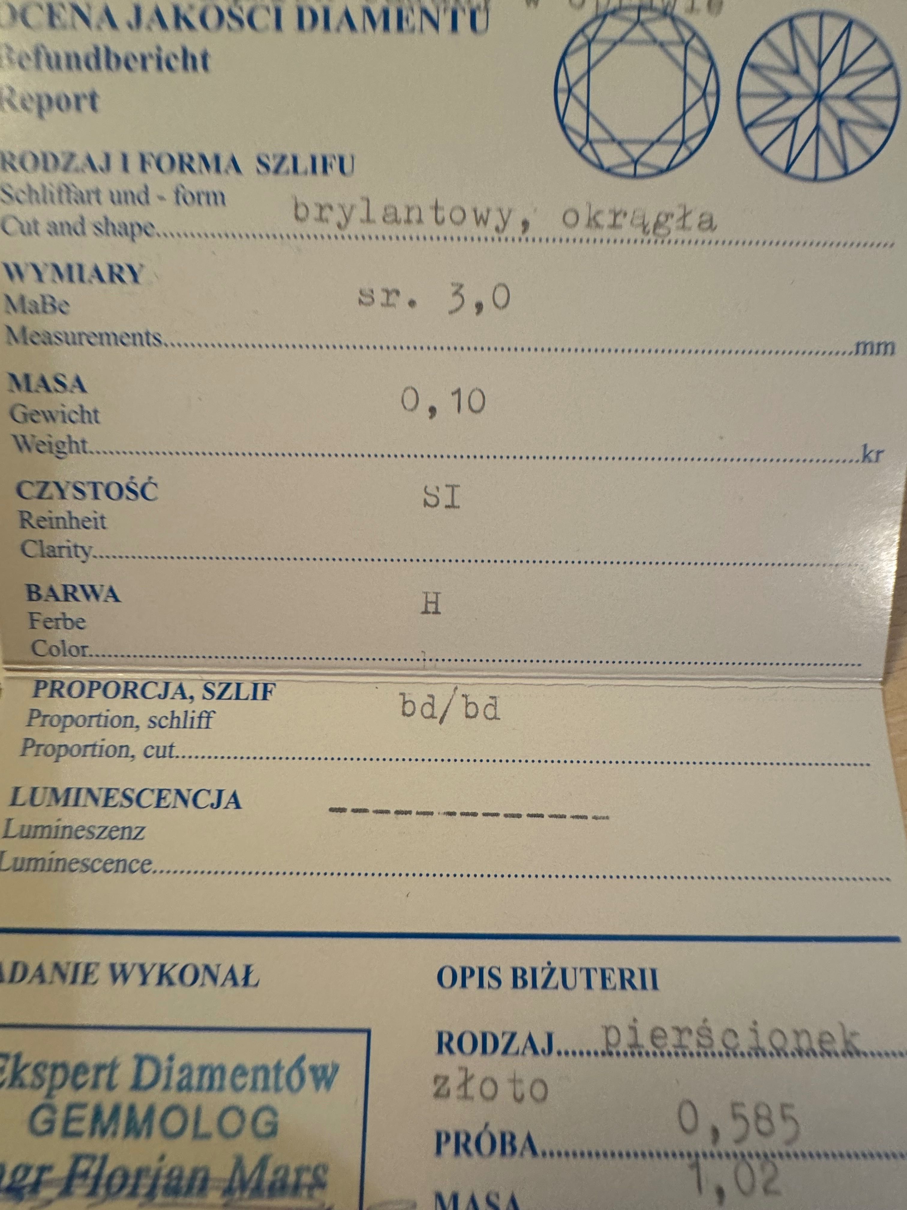 Złoty pierścionek z brylantem