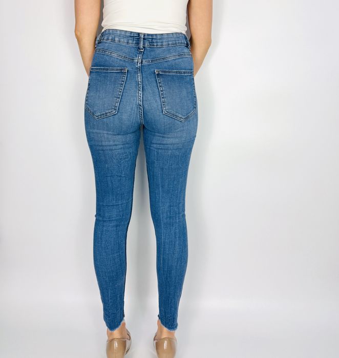 Jeansy skinny z przetarciami M 38 Denim Co.
