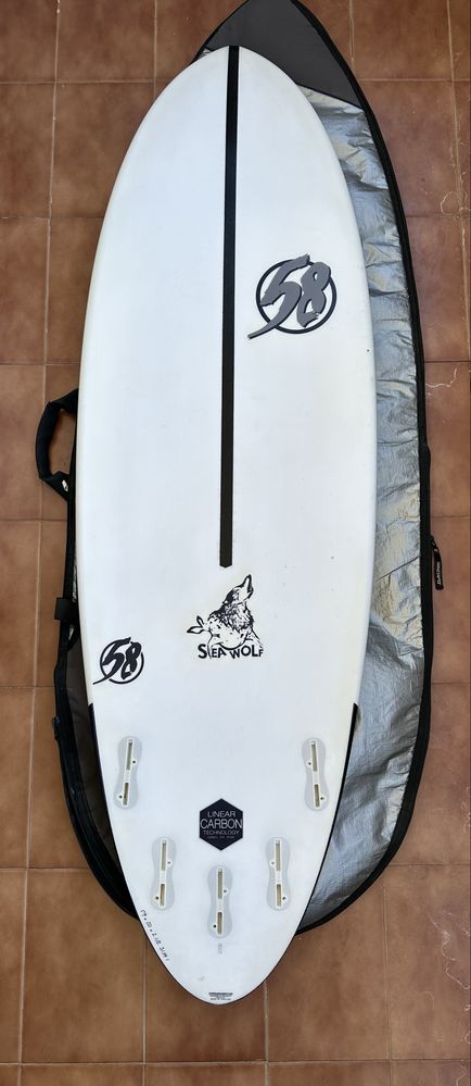 Prancha epoxy 5’9 31L  + saco Dakine