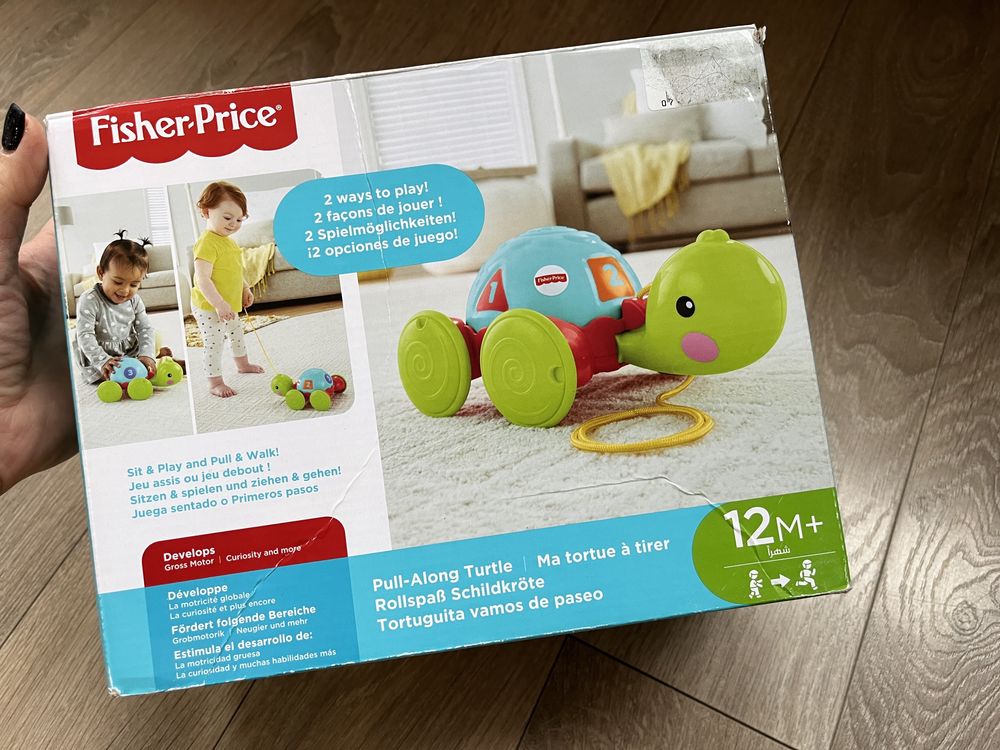 Черепаха каталка бренду Fisher Price