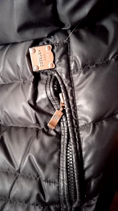 Женский пуховик Hetrego.