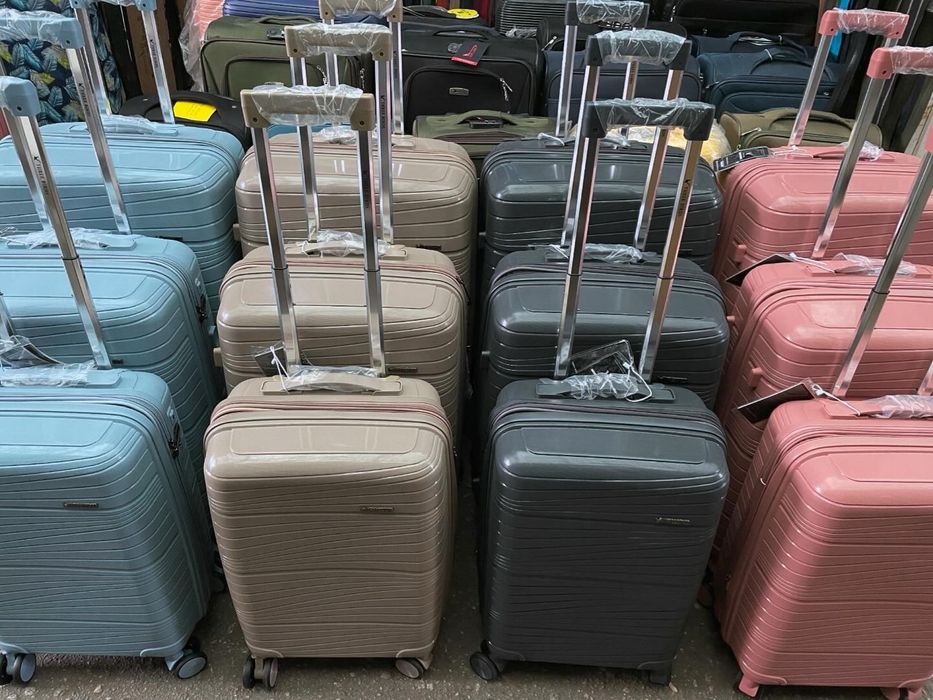 Чемоданы ткань и полипропилен