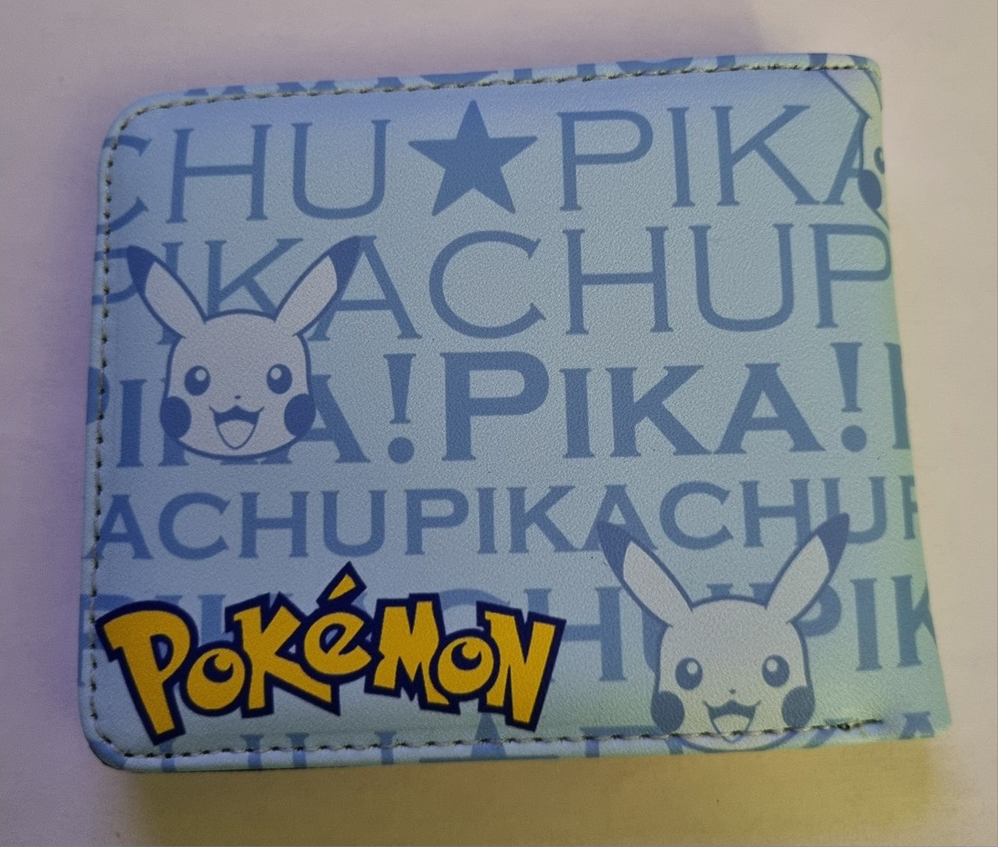 Fajny nowy portfel Pokemon Pikachu. Świetna jakość!