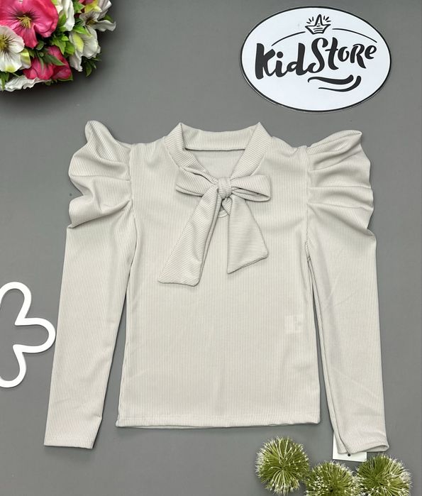 Beżowa bluzeczka dla dziewczynki z kokardką