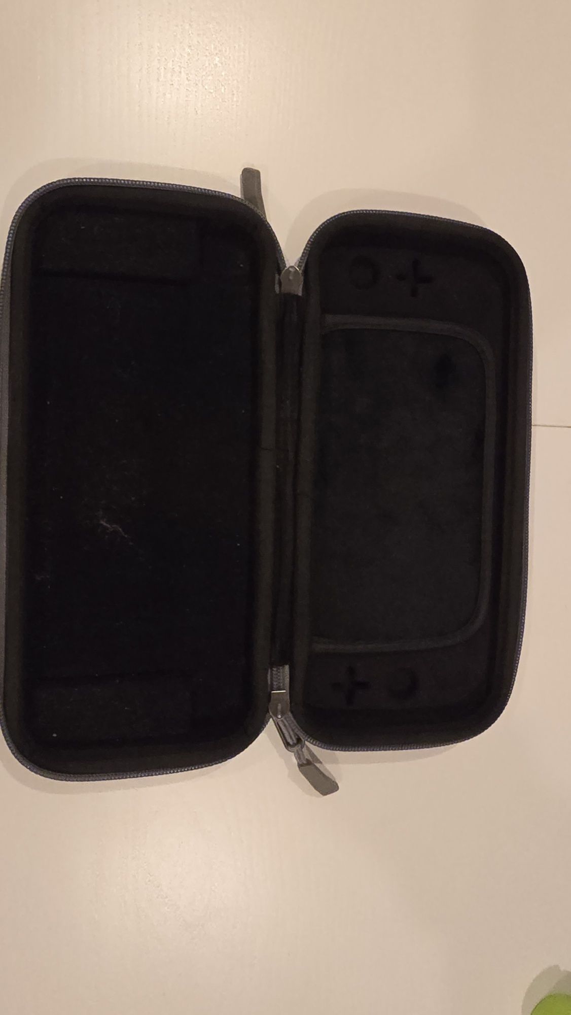 Nintendo switch +  bolsa de transporte + 1 jogo