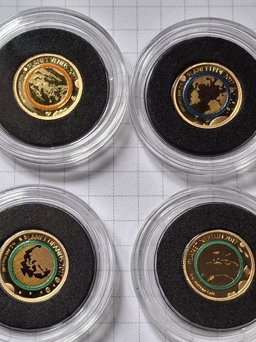 10 золотих монет 999 проби