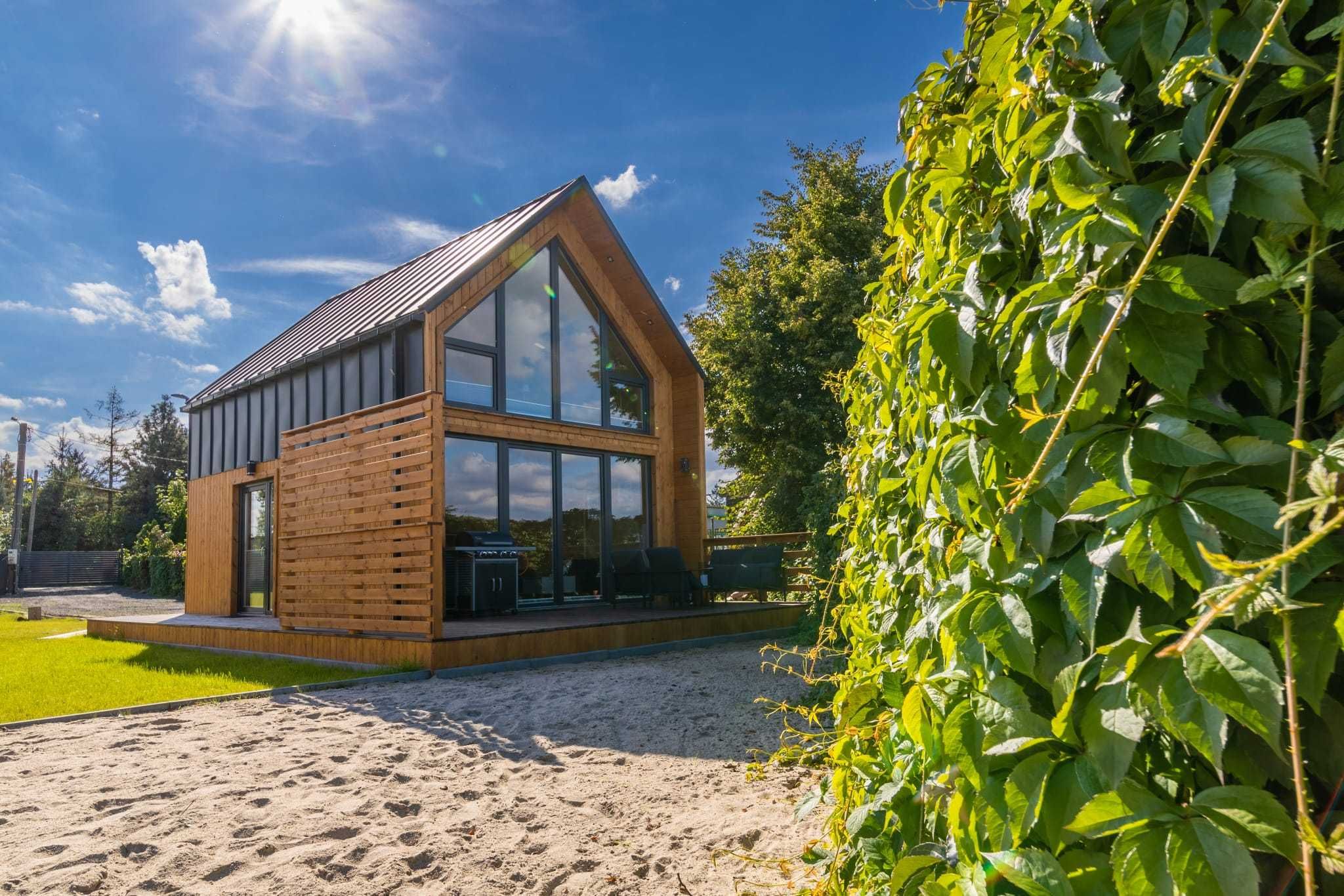 Domek Domki  Kunice  z własnym Jakuzzi  nad jeziorem prywatna plaża