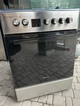Нова газова плита з електричною духовкою