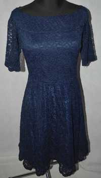 3* Eleastyczna sukienka koronkowa Orsay 38