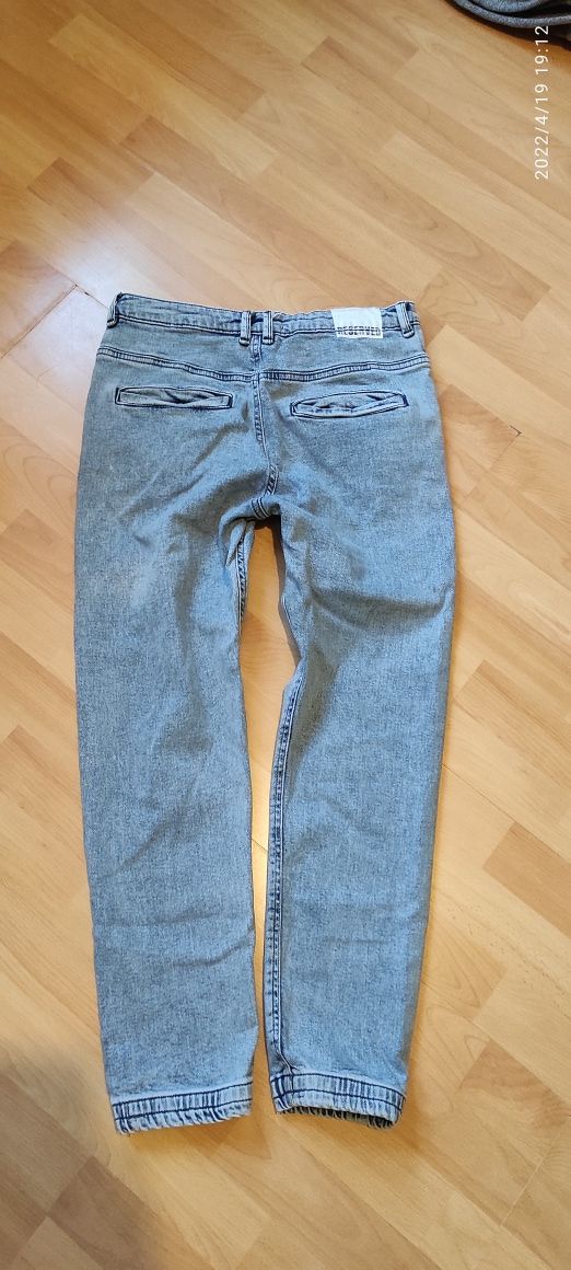 Spodnie jeansowe Reserved chłopięce idealnym stan 164