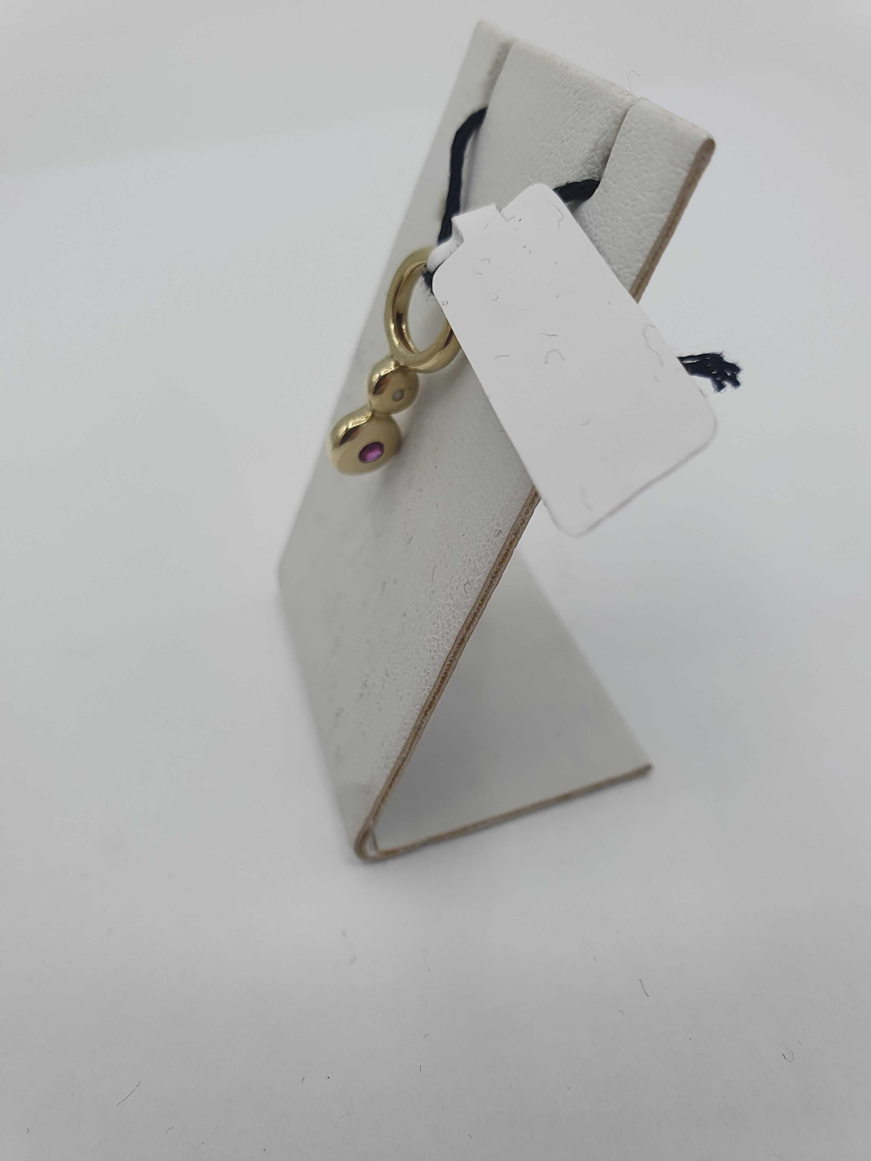 Złota zawieszka z diamentem i granatem P: 333 / G: 1,35