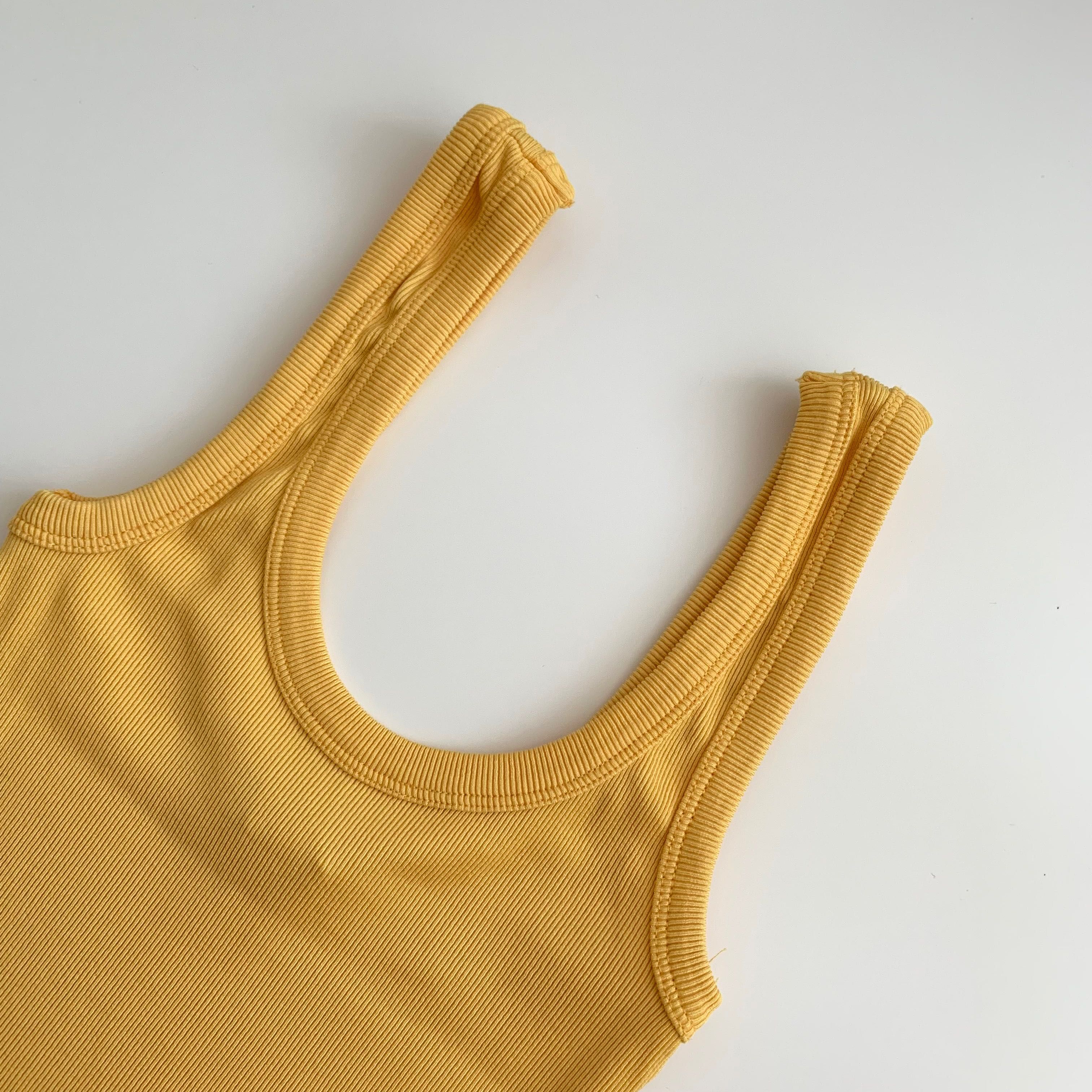 żółta sukienka midi z prążkowanego materiału na ramiączkach H&M 34/XS