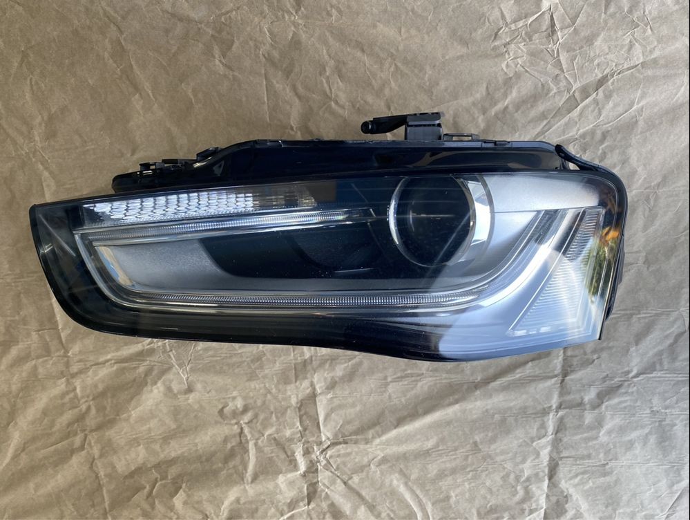 Farol Esq Audi A4