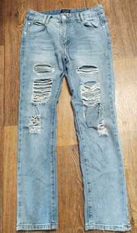 Модные рваные джинсы бойфренды