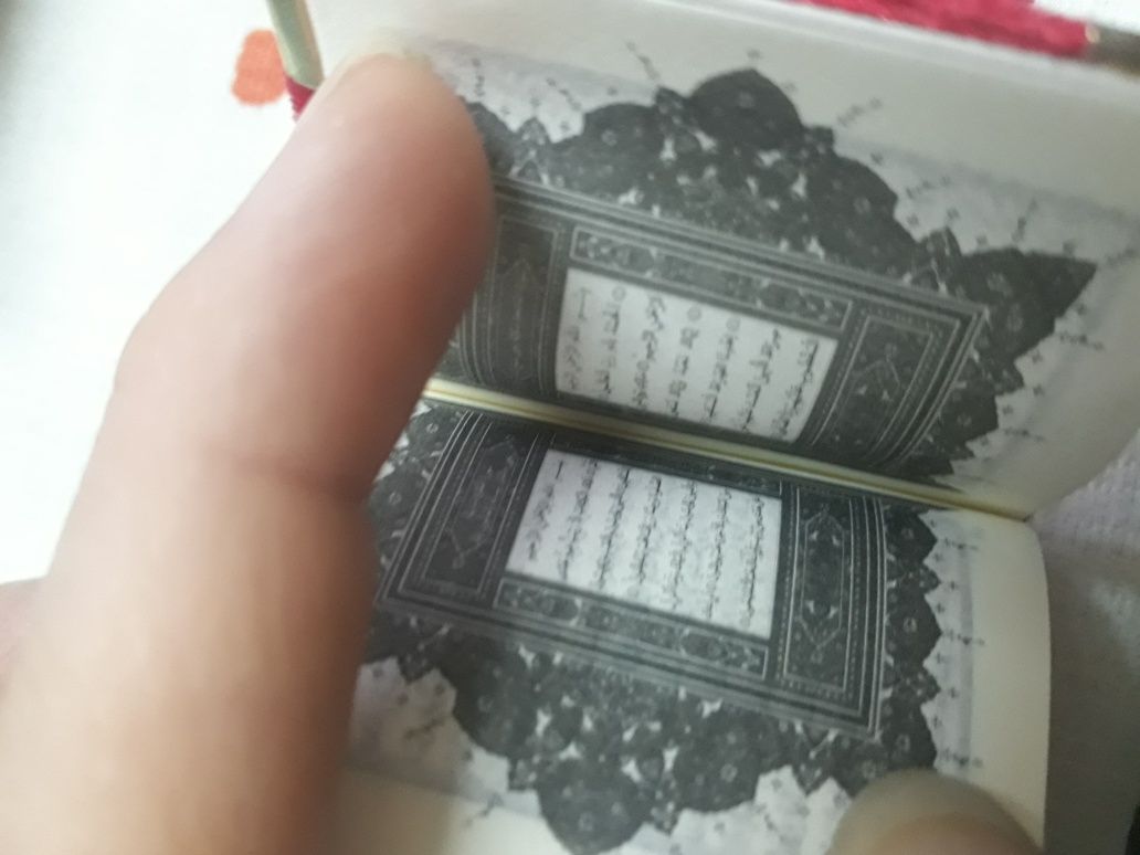 Коран. Коран маленькая книга оберег. Коран на арабском языке. Новый