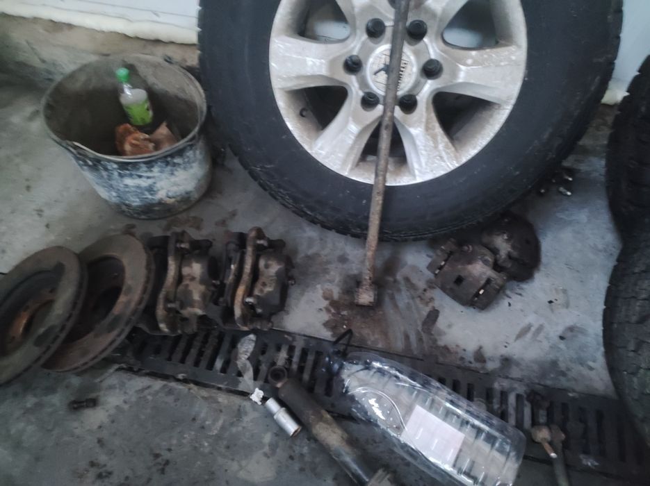 Супорт передній задній сангйонг рекстон rexton 1 2 W ssangyong ступиця