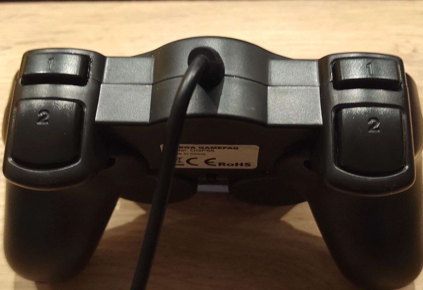 Kontroler pad marki Omega