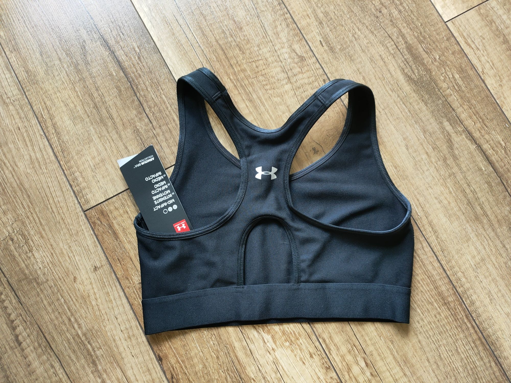 Stanik Under Armour Mid Impact czarny sportowy na treningi r. S