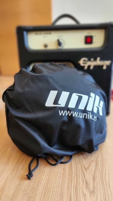 Casaco e capacete de mota novos para mulher