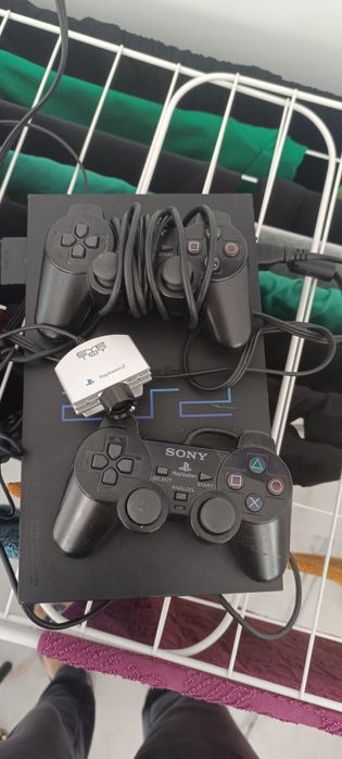 PlayStation 2, 3 Singstar + 1 jogo + câmara