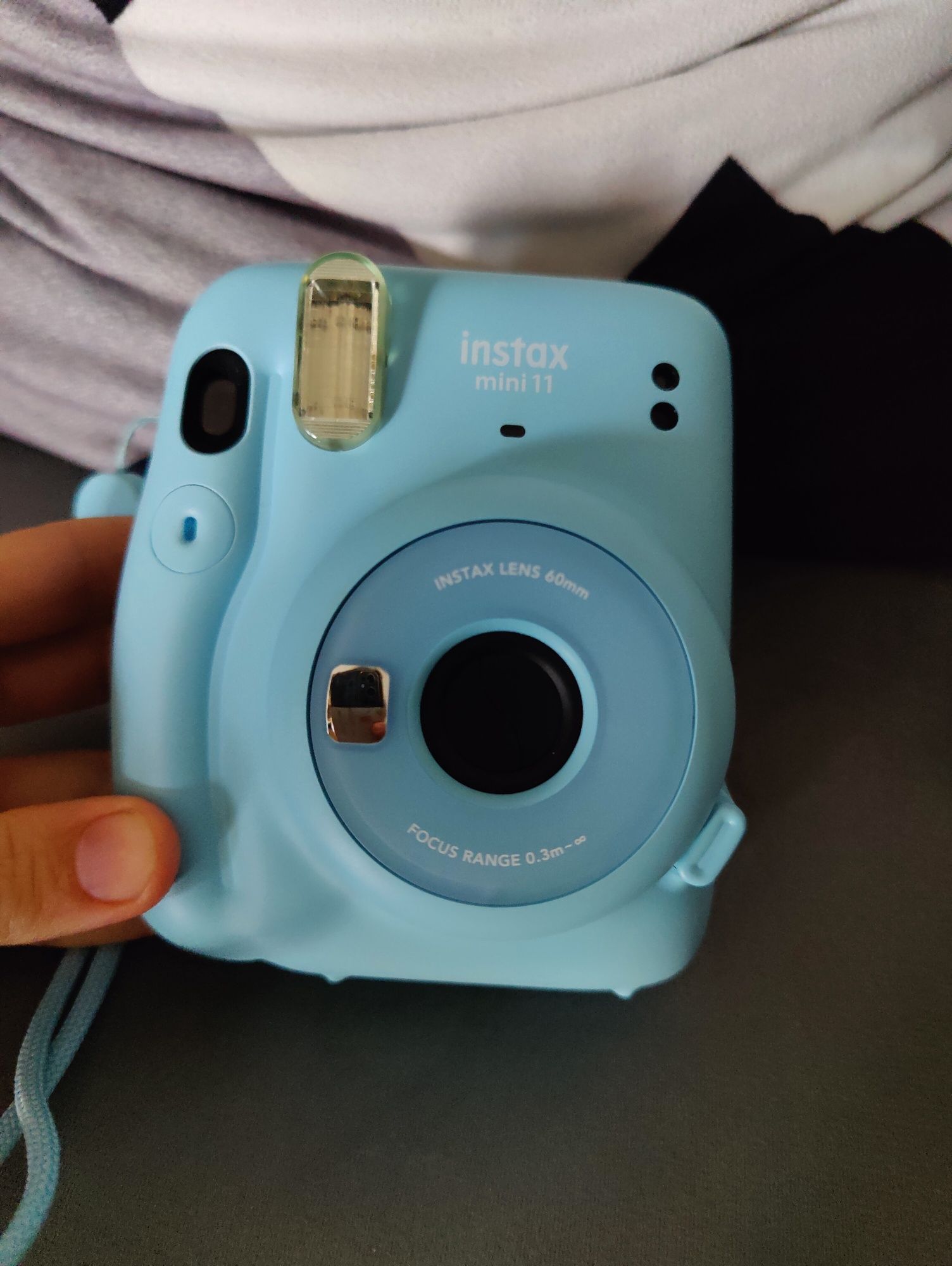 Máquina fotográfica instax
