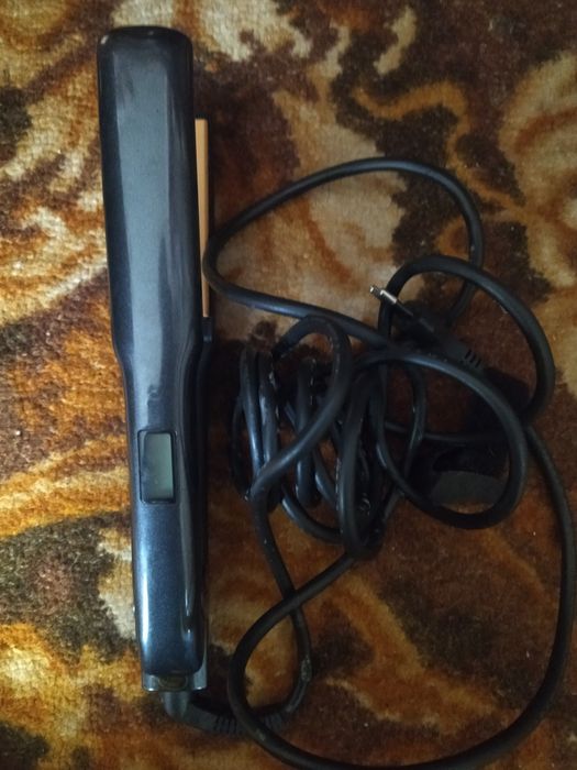 Вирівнювач для волосся