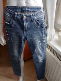 Spodnie damskie jeansy