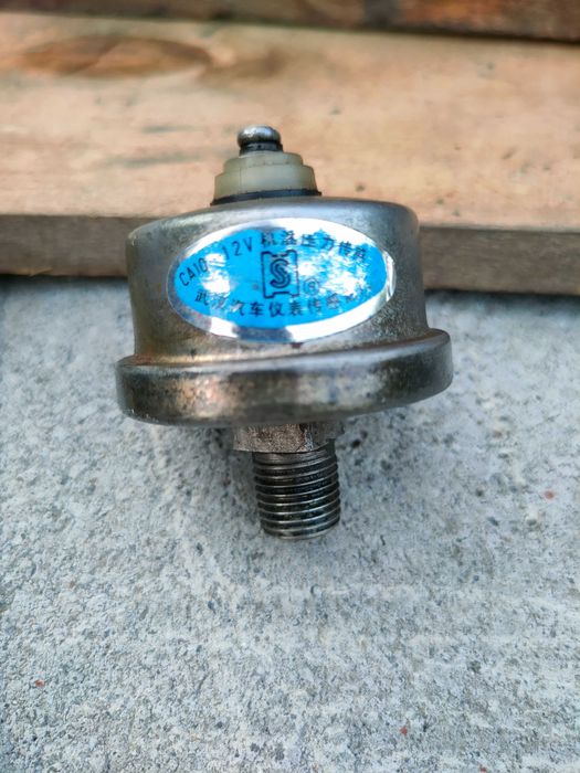 Датчик тиску до трактора сінтай 180