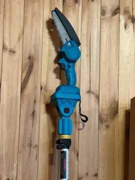 Акумуляторна пилка з подовжувачем для обрізки дерев