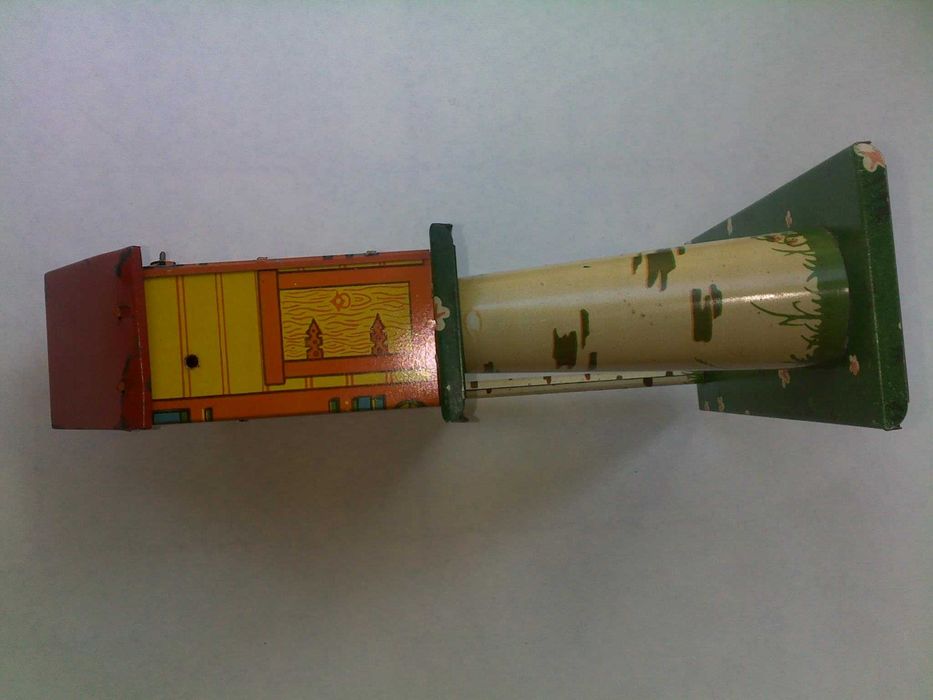 Детская жестяная заводная игрушка с ключиком ссср часы часики птичка