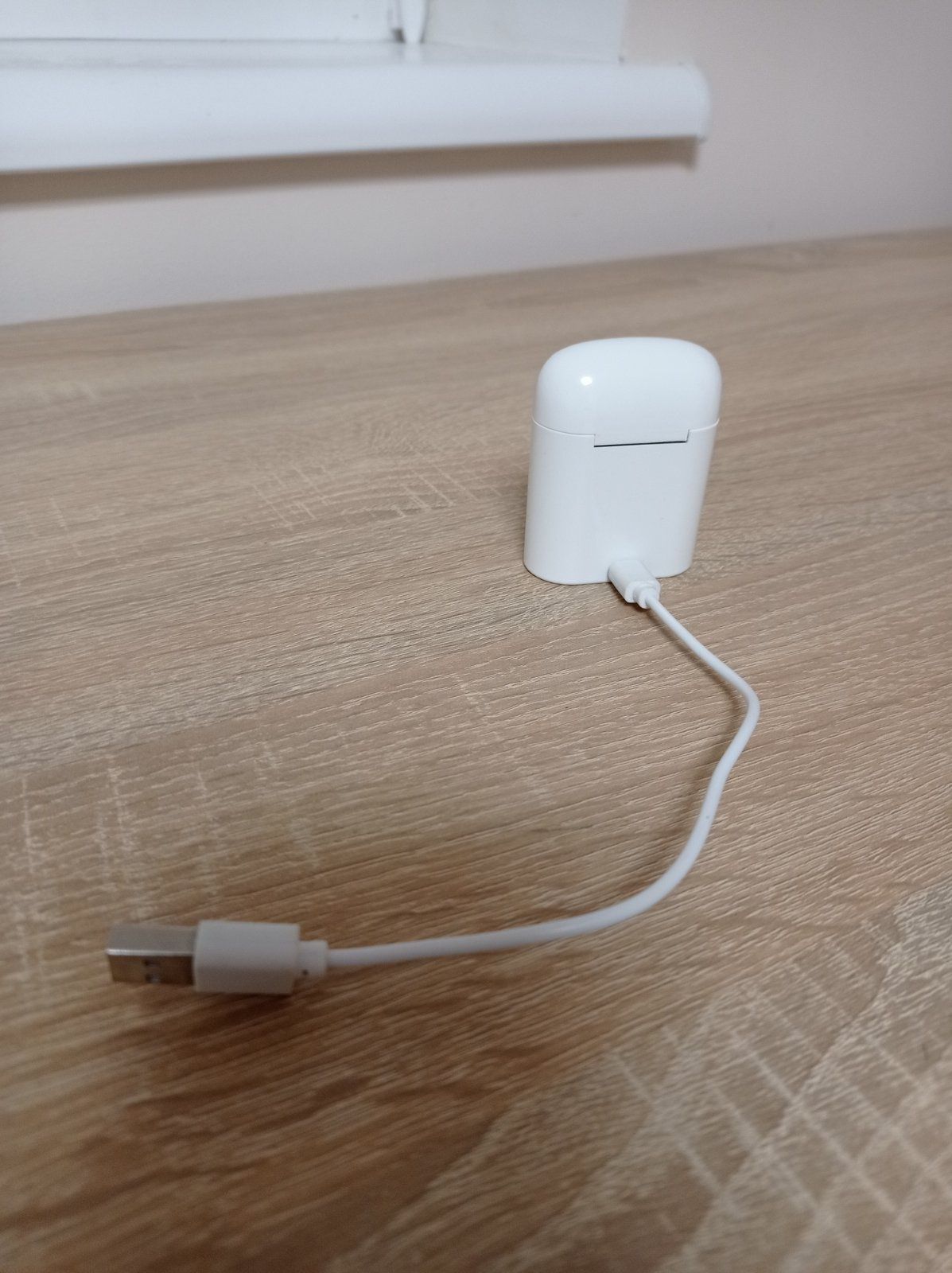 Безпровідні Bluetooth навушники AirPods .