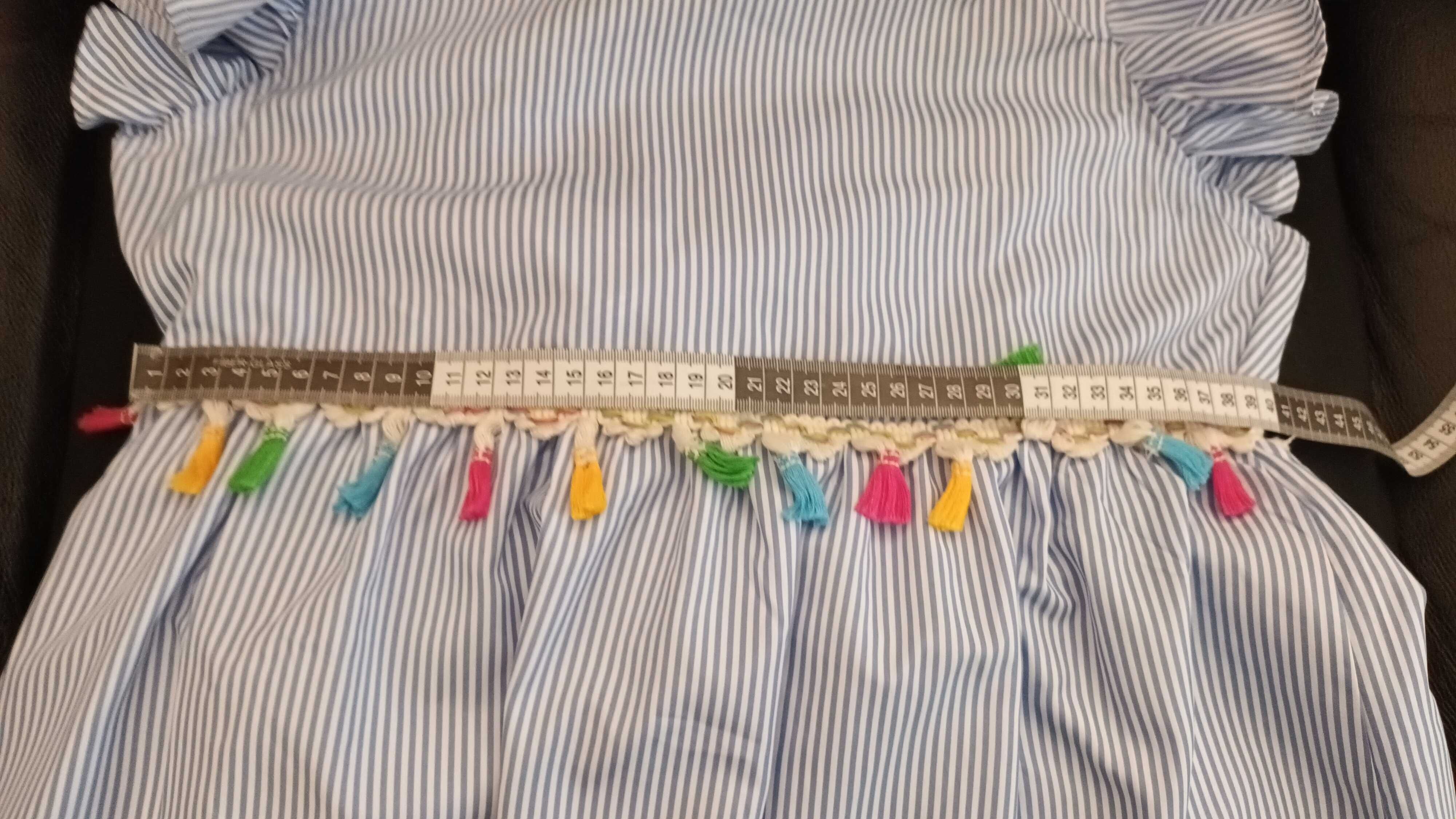 Blusa sem costas e com uma laçada
