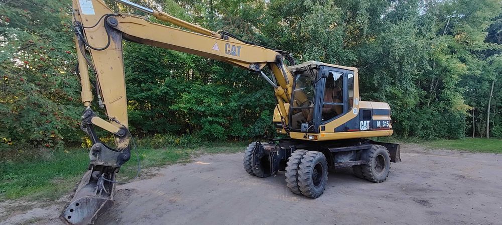Koparka kołowa cat m315