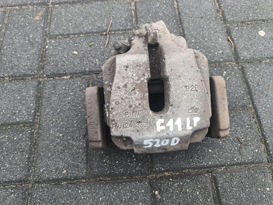 BMW 5 F10 F11 zacisk hamulcowy lewy przód