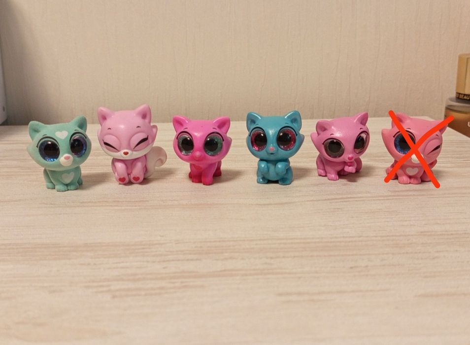 Іграшки котики..