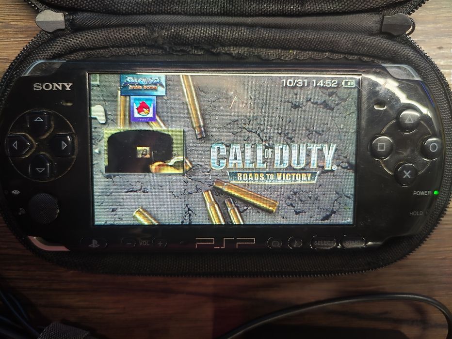 PSP 3006 +16гб игры +чехол Наруто +зарядка оригинал