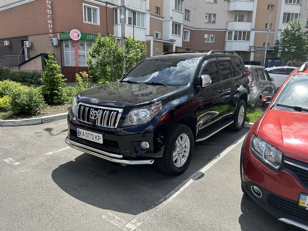 Обмін свого автопарку самоскидів та Прадо на нерухомість  Київ область