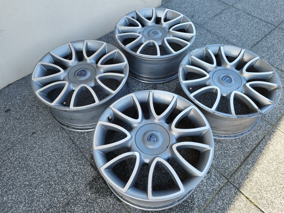 Oryginalne Felgi aluminiowe 17" Lancia Delta 4x98, ET 31 z dekielkami