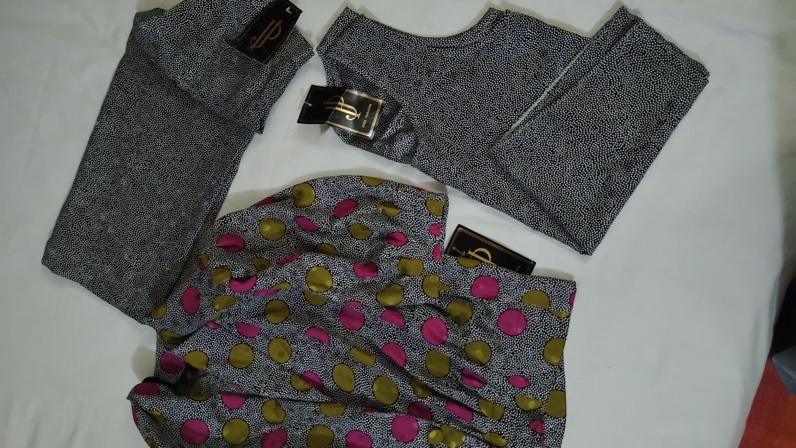 Conjunto blusa, saia e top.