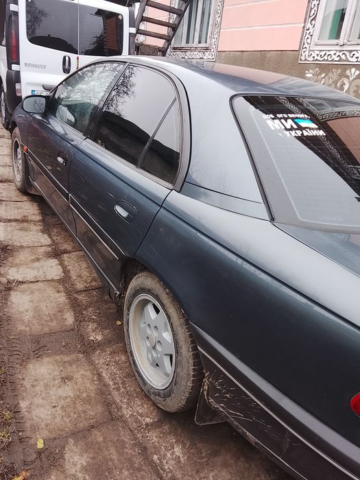 Опель Омега б 2.0