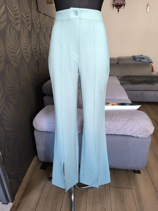 Miętowe spodnie z szeroką nogawką i wysokim stanem 32 XXS nowe