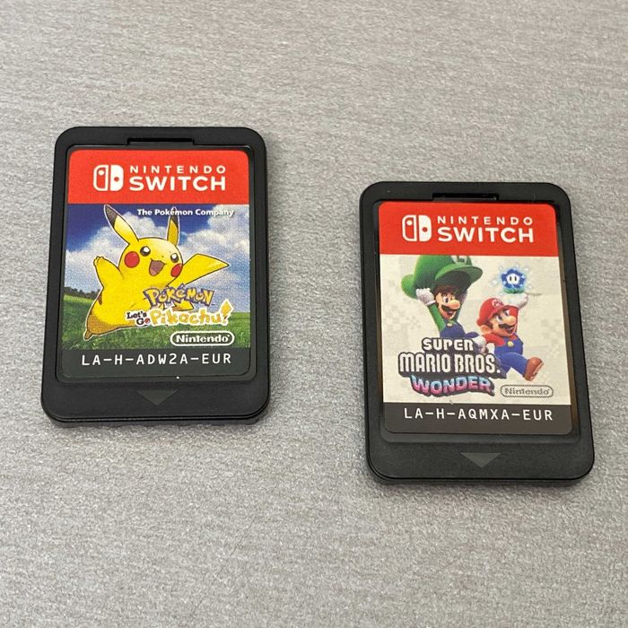 Nintendo Switch V2 (Neon Blue/Red) + Jogos
