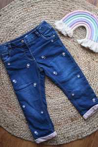 Jeansy dziewczęce spodnie w kwiatki C&A
