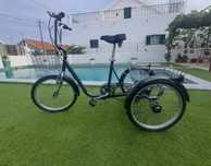 Bicicleta de três rodas