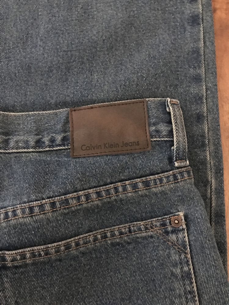 Śliczne spodnie Calvin Klein męskie rozmiar M